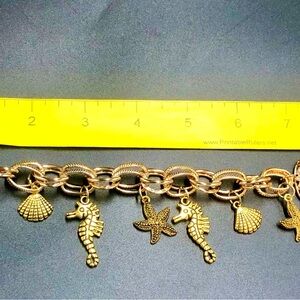 Gold Nautical Charm Bracelet with Seashell and Starfish